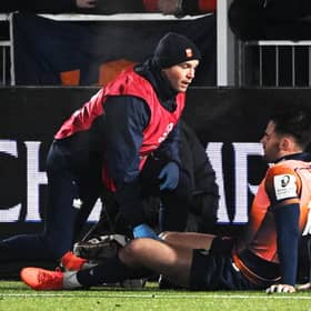 Edinburgh's Matt Currie goes down injured during the Investec Champions Cup match against Gloucester at Hive Stadium.