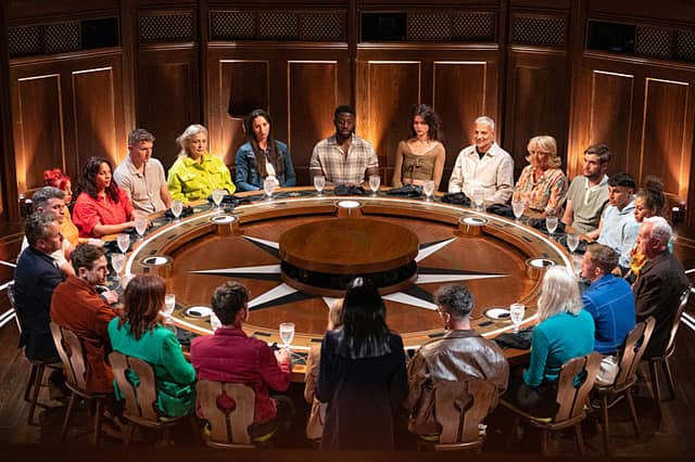 The cast of series four of The Traitors meet around the round table.