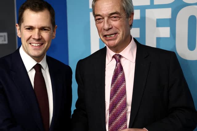 Nigel Farage welcomes for the former Conservative Shadow Justice Secretary Robert Jenrick into the Reform UK party (Picture: Henry Nicholls)