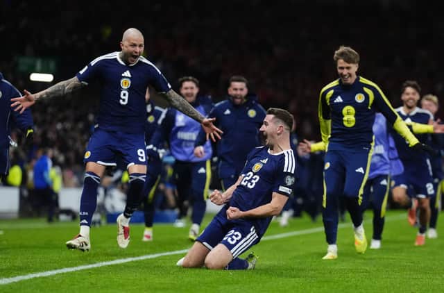 Kenny McLean celebrates scoring at Hampden as Scotland reach the World Cup finals