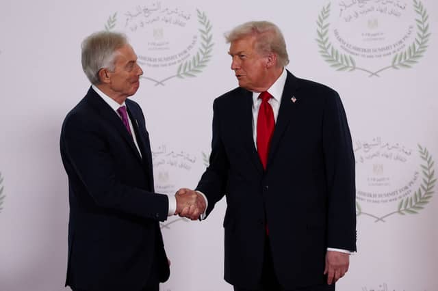 Former prime minister Sir Tony Blair and US President Donald Trump shakes hands during the Sharm El Sheikh Peace Summit in Egypt. Picture date: Monday October 13, 2025.