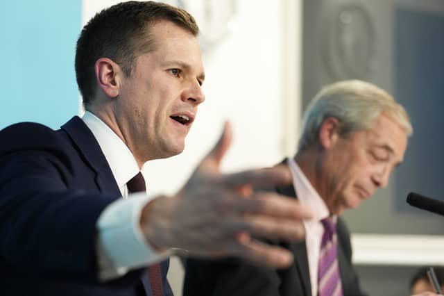 Robert Jenrick with Reform UK leader Nigel Farage at a press conference in Westminster