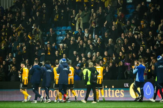 The Auchinleck players take the applause of their fans at Rugby Park.