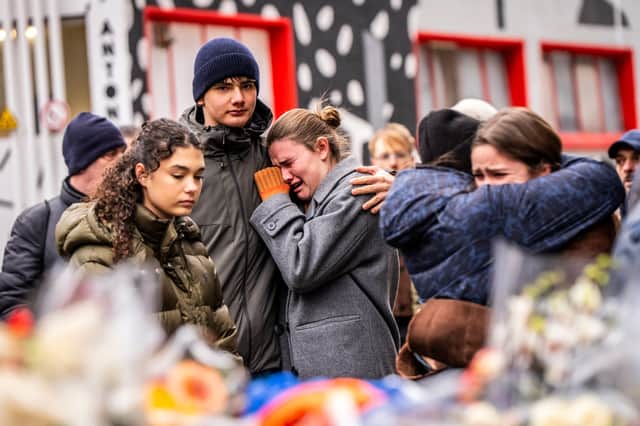 Mourners gather near Le Constellation bar in the Alpine ski resort town of Crans-Montana where dozens of people died when a fire ripped through the venue during New Year's celebrations (Picture: Maxime Schmid)