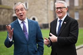 Andrew Rosindell, right, the MP for Romford, has become the latest Conservative politician to join Nigel Farage's Reform UK party leader (Picture: Leon Neal)