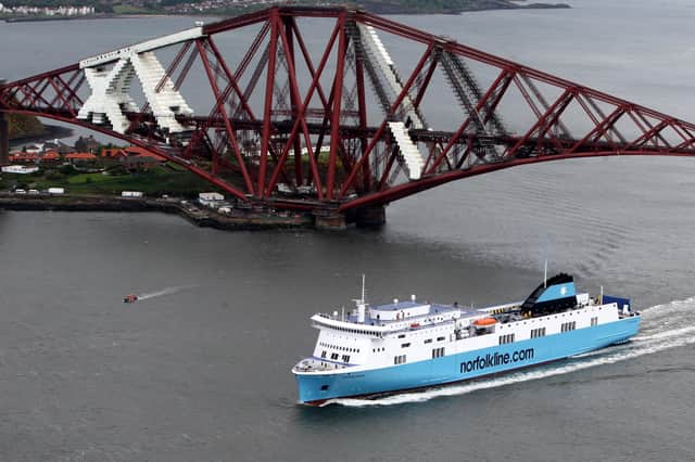 A ferry that operated on the previous Zeebrugge-to-Rosyth route travels under the Forth Bridge (Picture: Andrew Milligan)