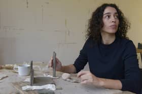 Artist Yasmine Rifaii working on her installation ‘Daydreams of the Razor Fleet’, while on residency at Cove Park. Credit: Alan Dimmick