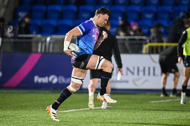 Jack Dempsey warms up before the Investec Champions Cup Round 4 match between Glasgow Warriors and Saracens at Scotstoun.