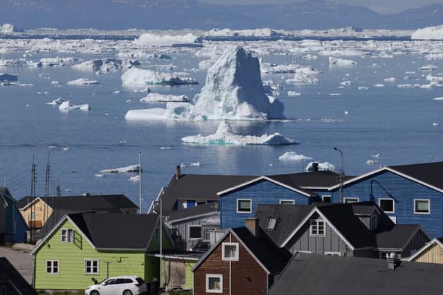 Meltwater and ice are pouring off Greenland, raising global sea levels by a millimetre every year (Picture: Sean Gallup)