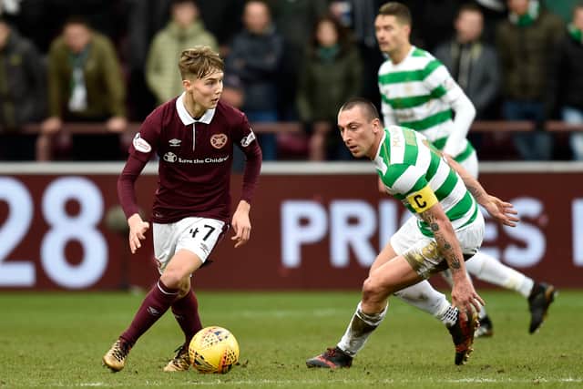 Hearts' Harry Cochrane (left) with Celtic captain Scott Brown during the 4-0 win at Tynecastle in December 2017.