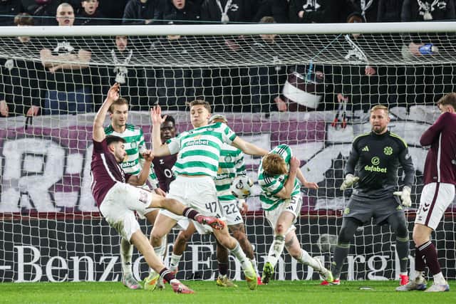 Hearts' Claudio Braga fires past Kasper Schmeichel to make it 2-2 against Celtic at Tynecastle.
