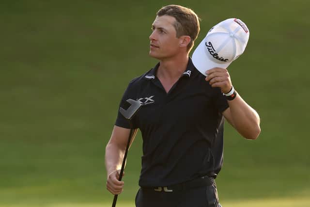 Callum Hill acknowledges the crowd on the 18th green during the third round of the Bahrain Championship at Royal Golf Club