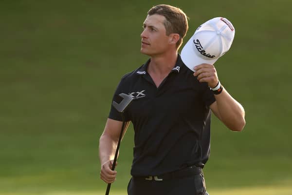 Callum Hill acknowledges the crowd on the 18th green during the third round of the Bahrain Championship at Royal Golf Club 