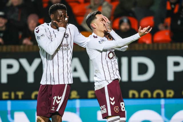 Landry Kabore and Alexandros Kyziridis were Hearts' goalscorers at Tannadice.