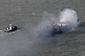 Smoke rises from the MV Solong cargo ship