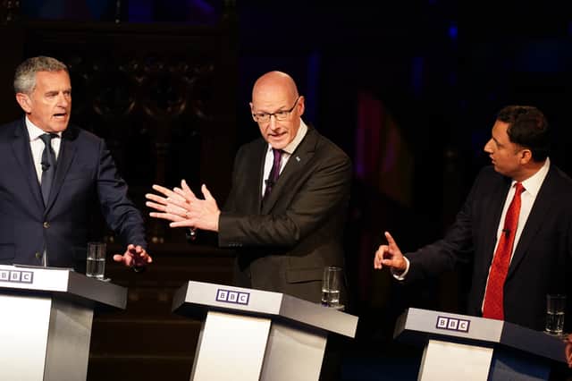 Debate Night presenter Stephen Jardine with SNP leader John Swinney and Scottish Labour leader Anas Sarwar during a special edition of the programme ahead of the 2024 election (Picture: Jane Barlow)