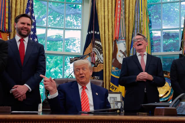 Peter Mandelson, right, laughs as Donald Trump holds court in the White House (Picture: Anna Moneymaker)