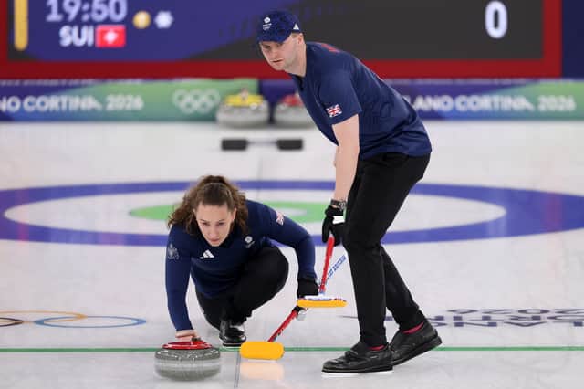 Jennifer Dodds and Bruce Mouat of Team GB during the Mixed Doubles round robin match against Switzerland at Cortina Curling Olympic Stadium on February 08, 2026 in Cortina d'Ampezzo, Italy. (Photo by Richard Heathcote/Getty Images)