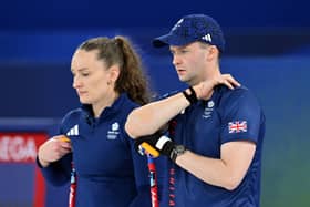 Jennifer Dodds and Mouat Bruce of Team GB react during the curling mixed doubles semi-final defeat by Sweden at the Milano Cortina 2026 Winter Olympic games at Cortina Curling Olympic Stadium in Cortina d'Ampezzo, Italy. (Photo by Mattia Ozbot/Getty Images)