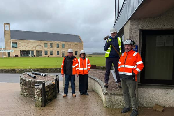 Royal Dornoch club captain Gary Bethune, holding thesledgehammer, pictured with, from left, Angus Gillies (G.F. Job), Sharon Ellen (G.F. Job) and Ewan MacGregor (Helica)  