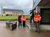 Royal Dornoch club captain Gary Bethune, holding thesledgehammer, pictured with, from left, Angus Gillies (G.F. Job), Sharon Ellen (G.F. Job) and Ewan MacGregor (Helica)  