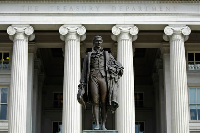 A statue of Alexander Hamilton stands in front of the US Treasury in Washington, DC (Picture: Chip Somodevilla)