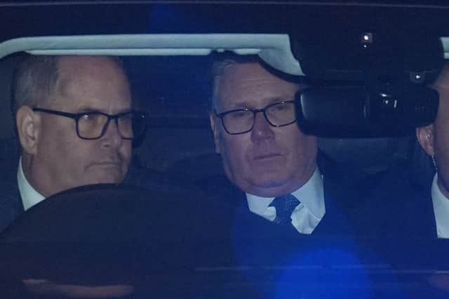 Prime Minister Sir Keir Starmer (centre) leaving the Houses of Parliament, London, on Monday after announcing he was not resigning and "concentrating on the job in hand".