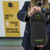 Pupils will have to lock their phones away in pouches all the time they’re at school