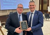 Montrose Golf Links head professional Jason Boyd, left, is presented with the PGA in Scotland Toby Sunderland Award by Tristan Crew, the PGA’s Executive Director - Member Services at The Belfry