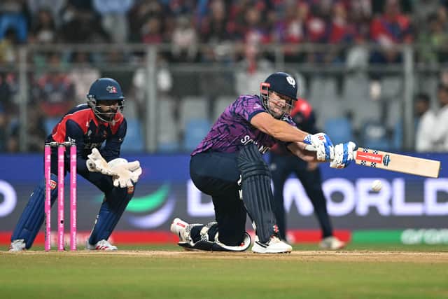 Scotland's George Munsey plays a shot during the 2026 ICC Men's T20 Cricket World Cup group stage defeat to Nepal at the Wankhede Stadium in Mumbai. (Photo by Punit PARANJPE / AFP via Getty Images)