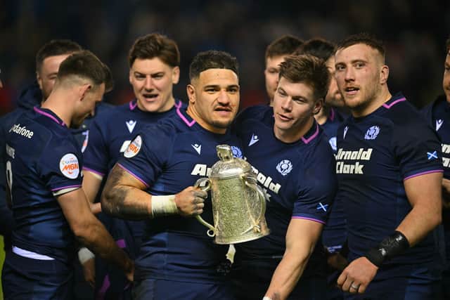 Scotland's captain Sione Tuipulotu holds the Calcutta Cup after the win over England at Murrayfield.