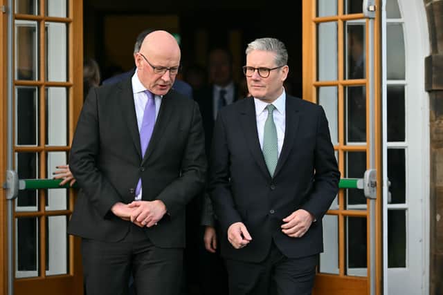John Swinney has called on Keir Starmer not to block plans to cap the price of essential supermarket food(Picture: Andy Buchanan/pool)