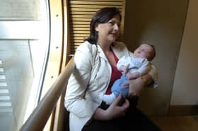 Fiona Hyslop MSP with eight week old son Paul Anderson at the new Scottish Parliament building in 2004
