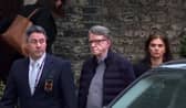 Peter Mandelson is led away by officers 