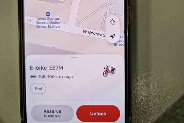 Swipe up the pop up identifying the bike after scanning its QR code to get the helmet discount