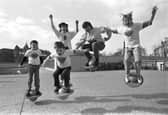 Lisa Coupar (right) and her young friends demonstrate the new Lolobal, an inflatable ball with a foot platform, at the Waverley market shopping centre on Princes Street, Edinburgh, in April 1986