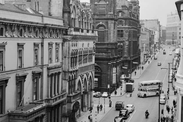 The former stock exchange building in the middle of the image on the left