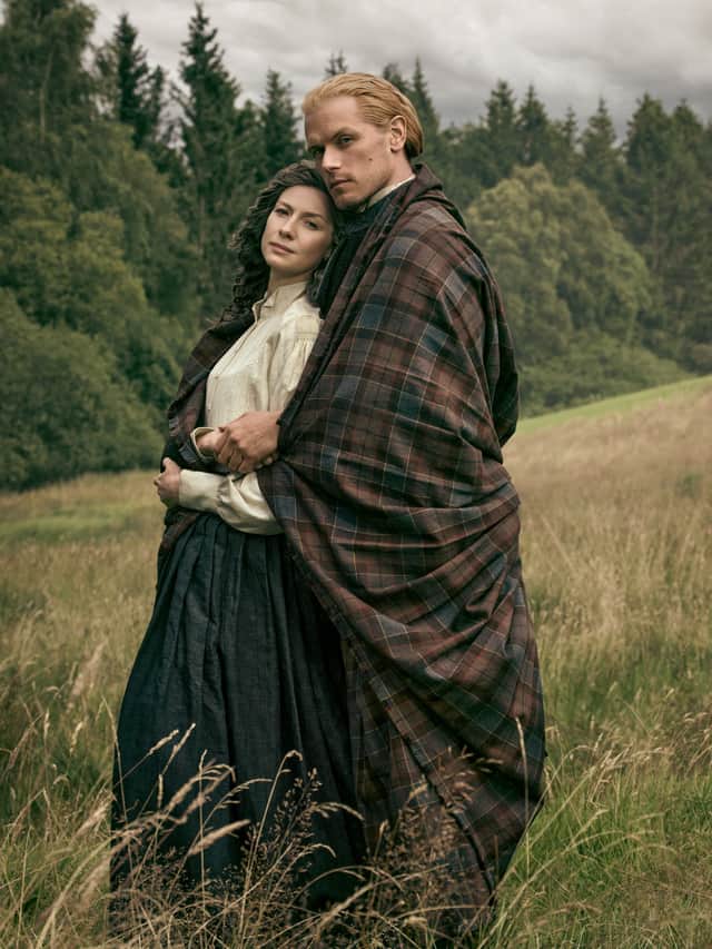 Caitríona Balfe and Sam Heughan as Jamie and Claire Fraser in Outlander, seasion eight.