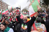 People take part in a demonstration outside the Iranian Embassy in central London, in support of the US and Israeli strikes on Iran