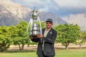 Casey Jarvis shows off the trophy after winning the Investec South African Open Championship at Stellenbosch Golf Club