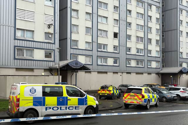 There are reports of a man with a bladed weapon in the Calder area of Edinburgh