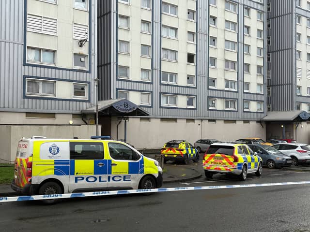 There are reports of a man with a bladed weapon in the Calder area of Edinburgh