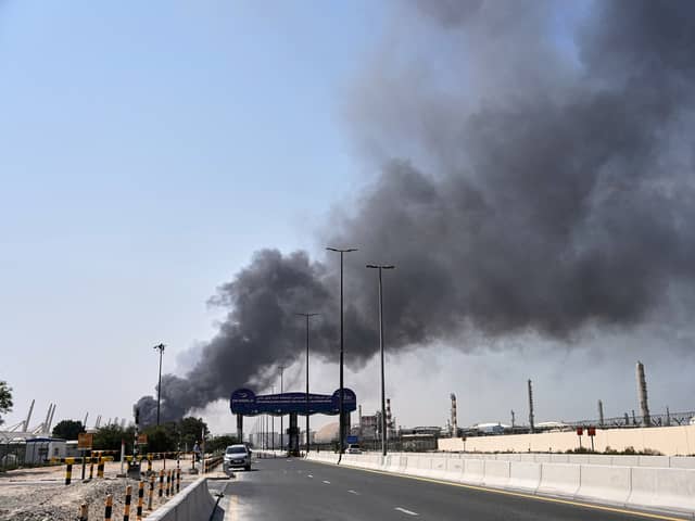Smoke rises after an Iranian drone attack in the port area of Dubai