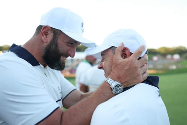 Jon Rahm and Rory McIlroy pictured celebrating Europe’s win in last year’s Ryder Cup in New York 