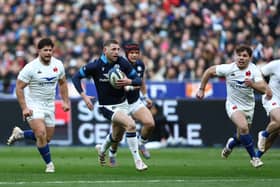 Finn Russell is chased by Antoine Dupont during the Six Nations match between France and Scotland at the Stade de France in Saint-Denis, northern Paris, on February 26, 2023.