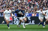 Finn Russell is chased by Antoine Dupont during the Six Nations match between France and Scotland at the Stade de France in Saint-Denis, northern Paris, on February 26, 2023.