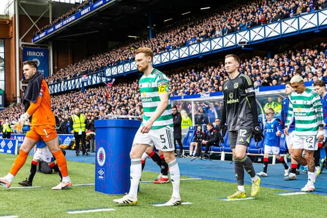 Scales leads Celtic out during the Scottish Cup quarter-final clash against Rangers at Ibrox.