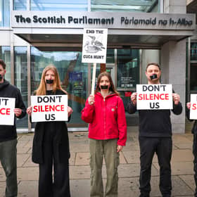 Activists hold silent protest outside Scottish Parliament against guga hunt