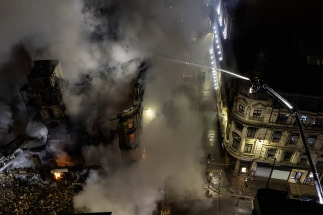 This image shows how the affected building has partially collapsed following the fire.