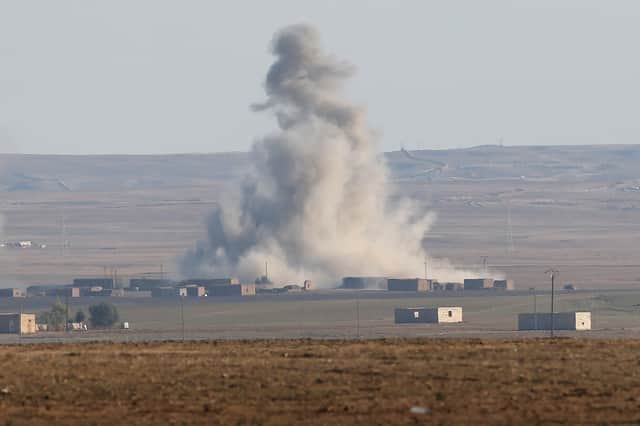 An airstrike by a US-led coalition warplane explodes on an Isis/Daesh position near the town of Hole, Rojava, Syria, in November, 2015 (Picture: John Moore)